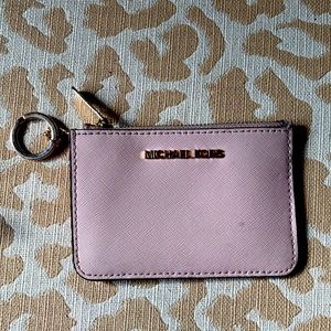 Michael Kors key chain card holder, the color is Blossom